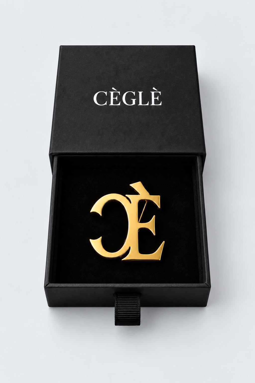 CÈGLÈ luxury gold plated monogram brooch in a gift box, perfect as a gift