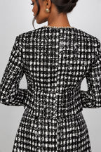 tweed blazer ans skirt suit in black and white elegant